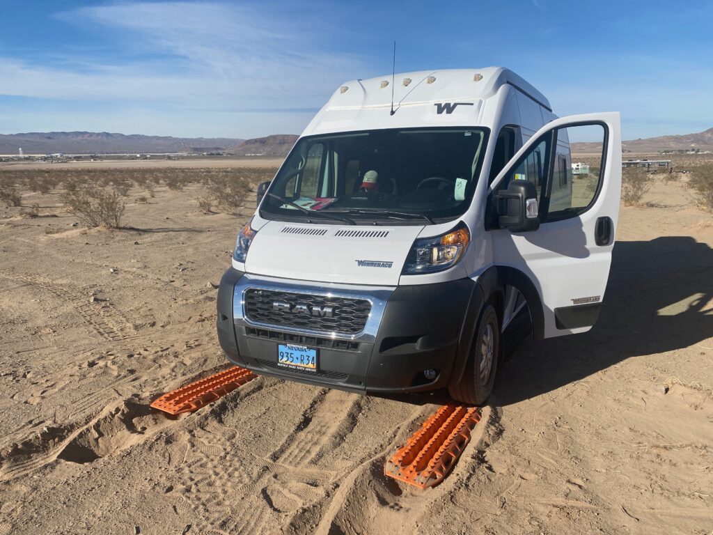 Van stuck in the sand